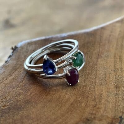 Ring trio of emerald, ruby and sapphire