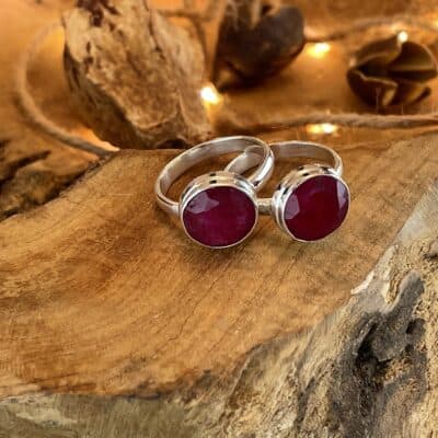 ring solitaire with ruby round